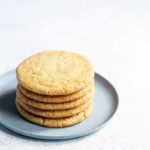 Momofuku Milk Bar's Corn Cookies stacked on a blue plate