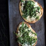 This Three-Cheese Naan Pizza with Arugula and Balsamic is perfect as a party appetizer or a quick meal! Get the recipe from Savory Simple.