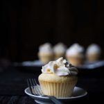 These Vanilla Maple Whiskey Cupcakes are a boozy delight, with a buttery maple center and a vanilla whiskey buttercream. Get the recipe from Savory Simple!