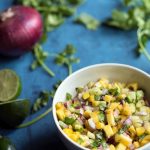 This mango salsa is fantastic serving with tortilla chips, but I also love using it as a topping for fish and chicken!