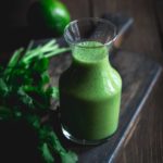 Cilantro lime dressing in a glass bottle