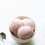 Strawberry rhubarb gelato recipe in a bowl with a spoon